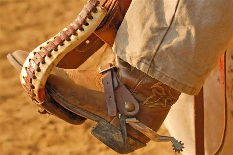 khaki pants and cowboy boots